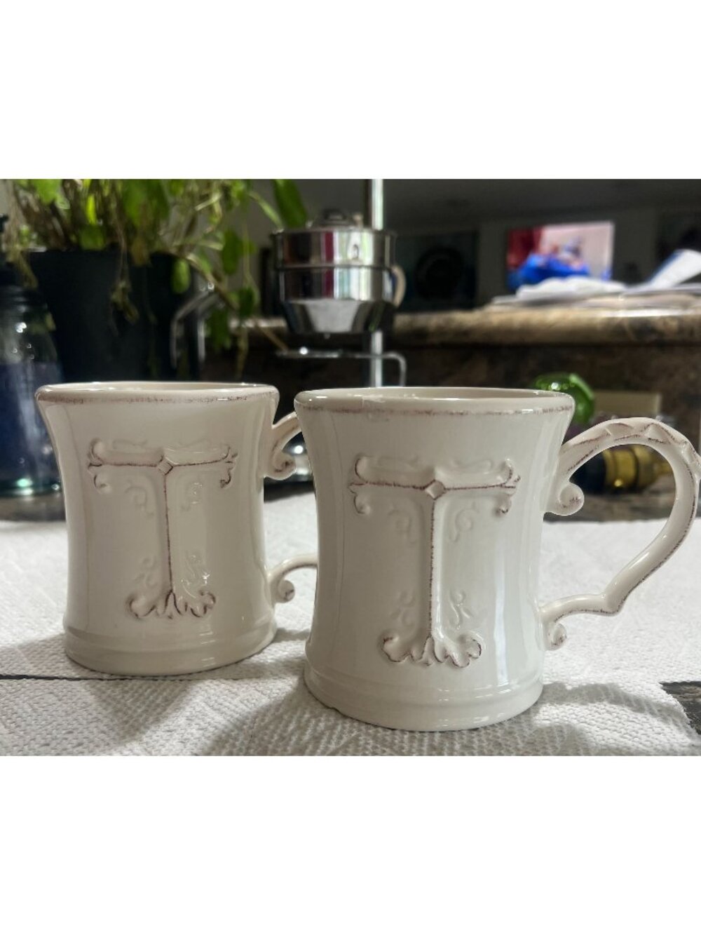 Two Pier 1 Imports Elizabeth Embossed"T" Ivory Ceramic Mugs Set Flourish Handle